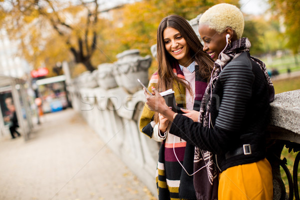 Multiracial Female Friends Drinking Coffee Outdoor Stock Photo C Boggy 9006565 Stockfresh