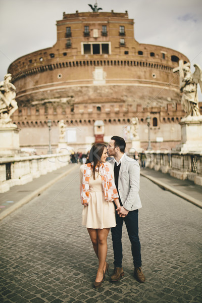 Loving couple by the Castel Sant'Angelo in Rome, Italy Stock photo © boggy