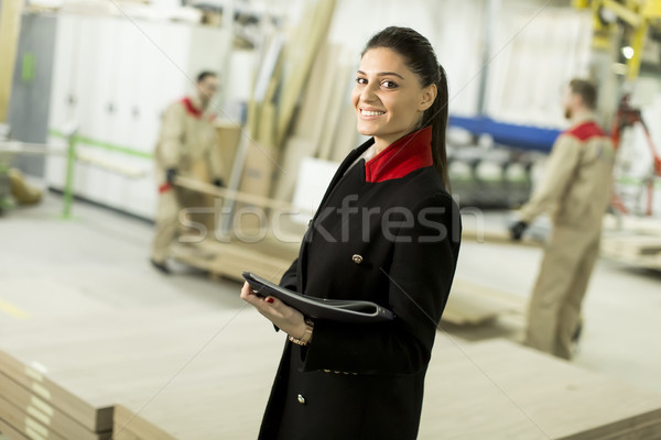 Female inspector at furniture industry Stock photo © boggy