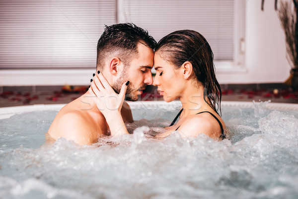 Loving couple in the wellness center Stock photo © boggy