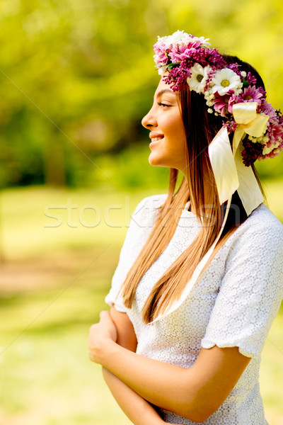Portre genç kadın çelenk taze çiçekler kafa Stok fotoğraf © boggy