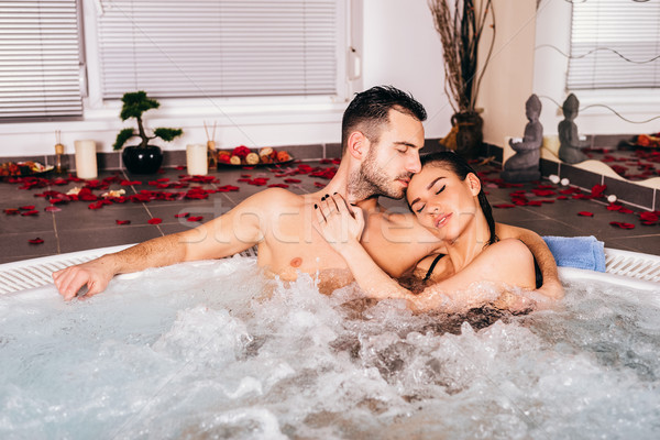 Loving couple in the wellness center Stock photo © boggy