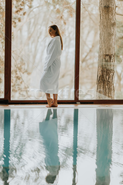 Joli jeune femme détente piscine spa centre [[stock_photo]] © boggy