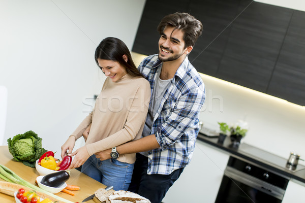 Young couple in the kitchen Stock photo © boggy