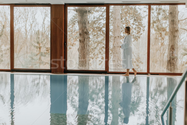 Joli jeune femme détente piscine spa centre [[stock_photo]] © boggy