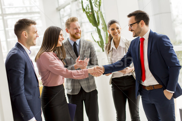 Business partners handshaking after making agreement with employ Stock photo © boggy