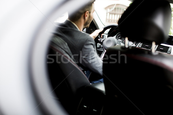 Young man in the car Stock photo © boggy