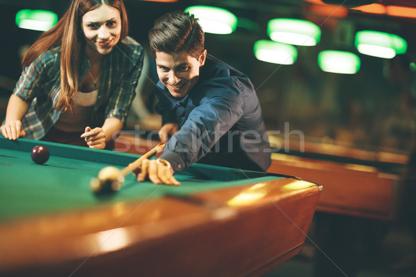 Young couple playing pool Stock photo © boggy