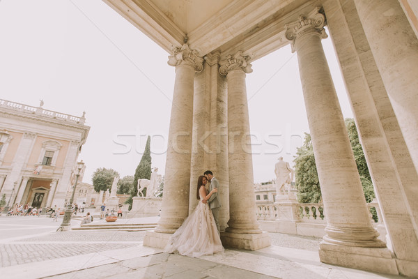 Young wedding couple on Capitoline hill in Rome Stock photo © boggy