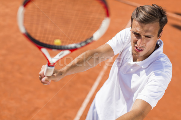 Joven jugando tenis verano jóvenes formación Foto stock © boggy