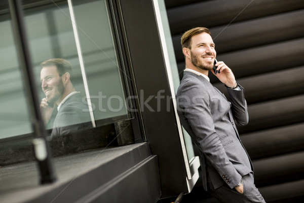 Foto stock: Bonito · moço · telefone · móvel · prédio · comercial · jovem · empresário