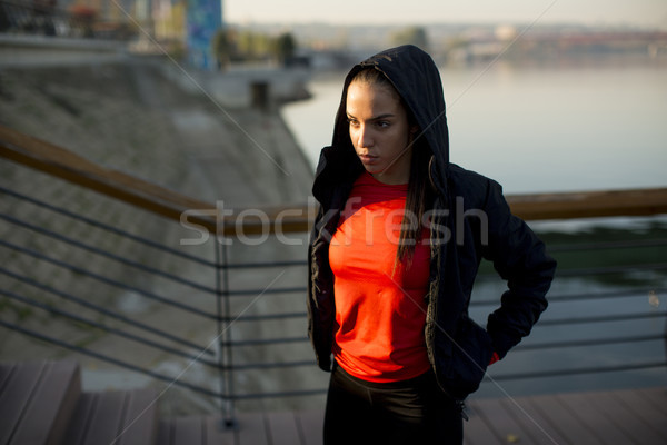 Young woman exercising outside Stock photo © boggy