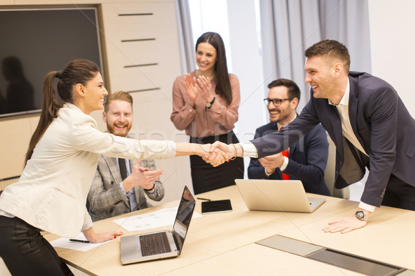 Business partners analyze the business results in modern office Stock photo © boggy