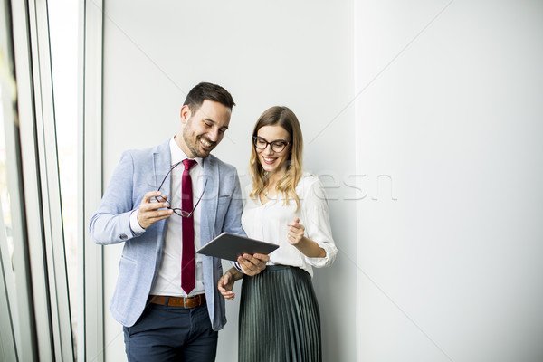 Boldog üzlet kollégák modern iroda tabletta Stock fotó © boggy