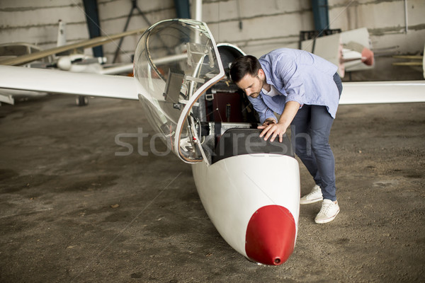 Jonge piloot vliegtuig knap man technologie Stockfoto © boggy