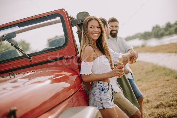 Jeunes potable voiture extérieur chaud [[stock_photo]] © boggy