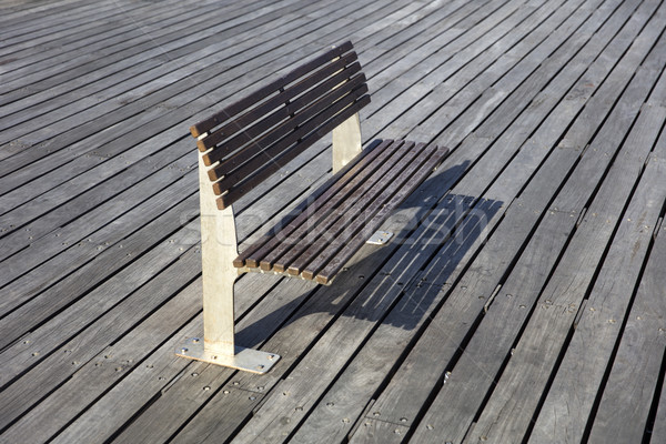 Stock photo: View at bench on the boardwalk