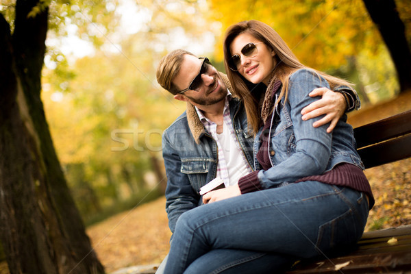 Young couple in the autumn park Stock photo © boggy