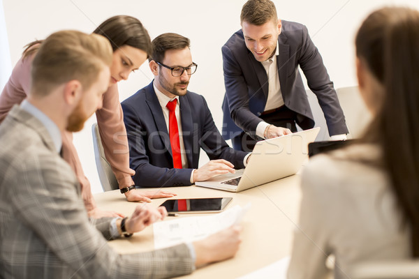 Young business people work in a team in a modern office Stock photo © boggy