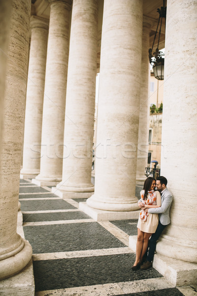 Loving couple at the St. Peter's Square in Vatican Stock photo © boggy