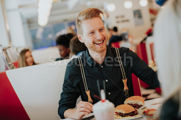 Foto stock: Moço · alimentação · cheeseburger · diner · carne · comida