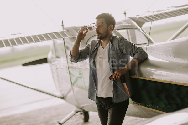 Jóvenes piloto avión vuelo guapo hombre Foto stock © boggy