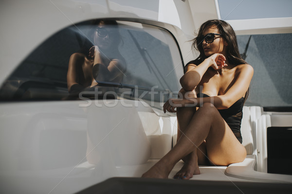 Joli jeune femme détente yacht vue Photo stock © boggy