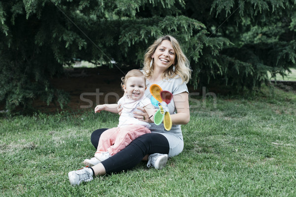 Mère fille séance pelouse cute peu [[stock_photo]] © boggy