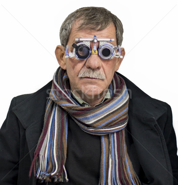 Man at ophthalmologist Stock photo © boggy