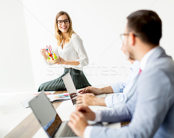 Business people around table during staff meeting Stock photo © boggy
