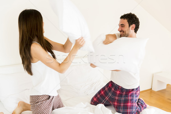 çift yatak yastık kavgası kadın adam Stok fotoğraf © boggy