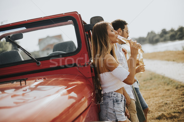 Jeunes potable voiture extérieur chaud [[stock_photo]] © boggy