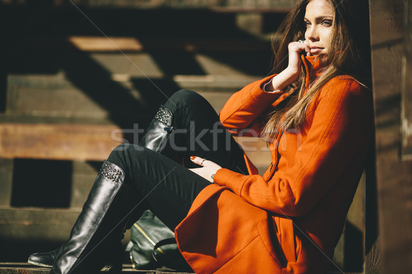 Pretty young longhair woman in the coat Stock photo © boggy