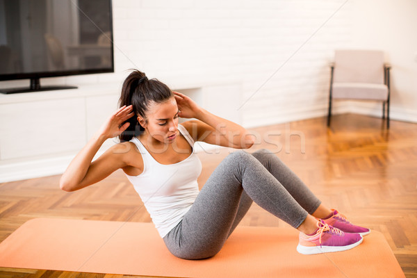 Jeune femme exercice chambre matin maison maison [[stock_photo]] © boggy