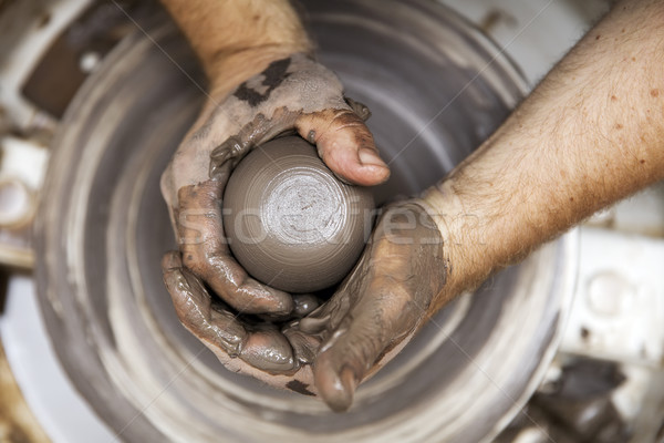Artista argila cerâmica girar roda Foto stock © boggy