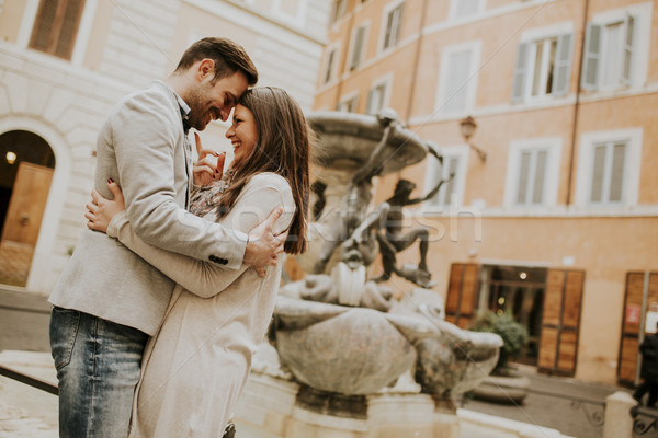 Happy loving couple, man and woman traveling on holiday in Rome, Stock photo © boggy