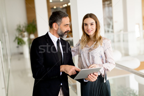 бизнесмен молодые деловая женщина таблетка портрет Сток-фото © boggy