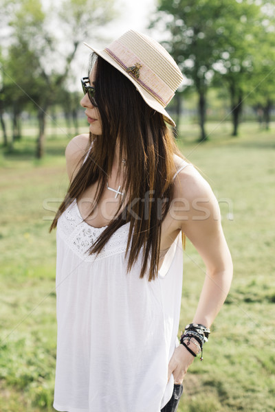 Stylish young woman in the park Stock photo © boggy