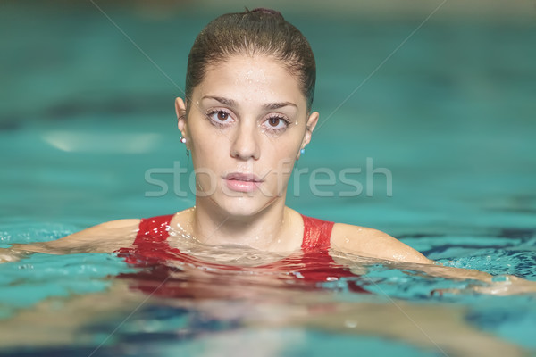 Stock photo: Young woman in the swimming pool