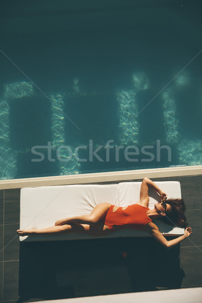 Stok fotoğraf: Genç · ince · güzel · bir · kadın · mayo · güneşlenme · yüzme