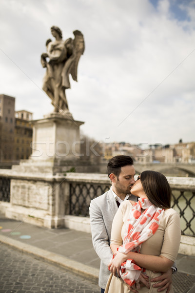 Loving couple by the Castel Sant'Angelo in Rome, Italy Stock photo © boggy