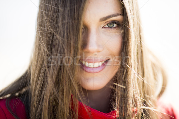 Pretty young longhair woman in the coat Stock photo © boggy
