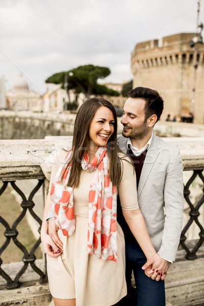 Loving couple by the Castel Sant'Angelo in Rome, Italy Stock photo © boggy