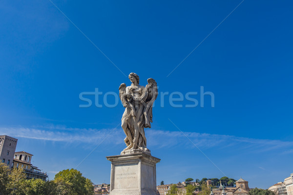 Angel statue at Sant Angelo Bridge in Rome Stock photo © boggy