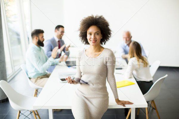 Multiethnic business team working at the same office Stock photo © boggy