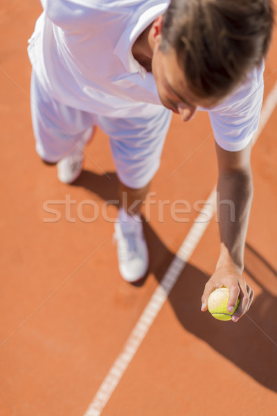 Giovane giocare tennis uomo sport giovani Foto d'archivio © boggy