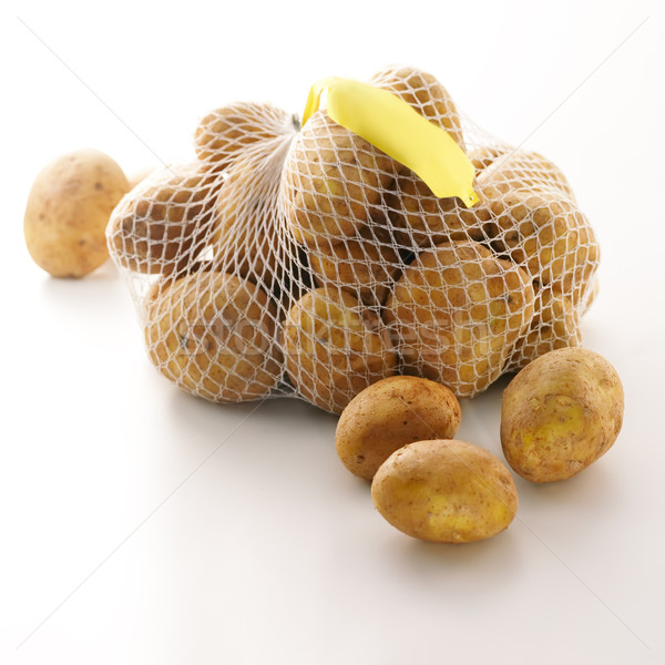 Sac fraîches pommes de terre prix tag blanche Photo stock © bogumil