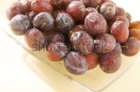 wet plums on a plate Stock photo © bogumil
