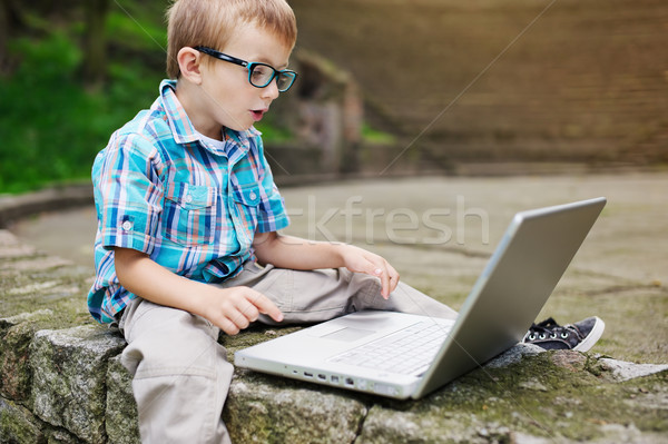 Boy surprised by internet Stock photo © bogumil