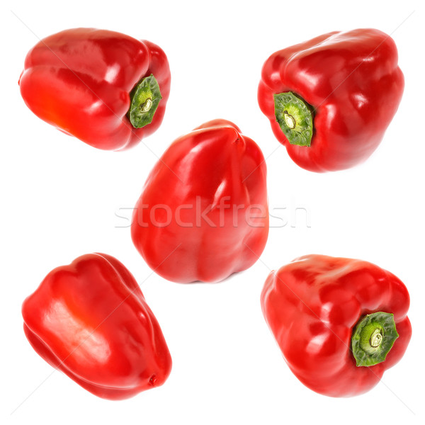 Stock photo: Five fresh red peppers isolated on white background